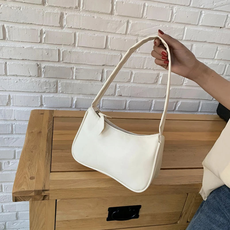 Retro forearm bag women's bow handbag PU leather bag Western style single shoulder minimalist